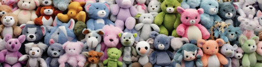 lots of stuffed animals line up on the wall