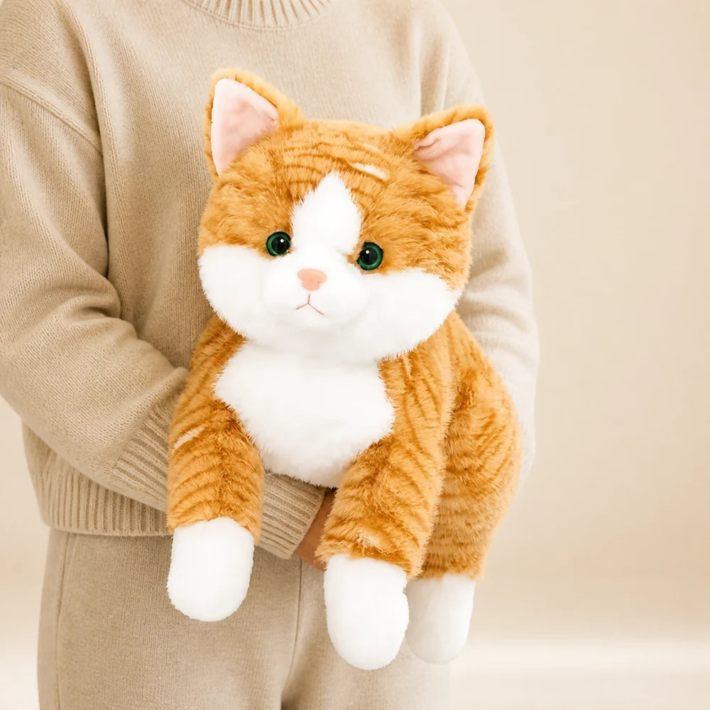 Orange Tabby Cat Plush Toy Held by Model