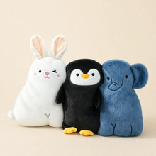 Cute Bunny Penguin and Elephant Animal Pillow Plushies on Warm Beige Background