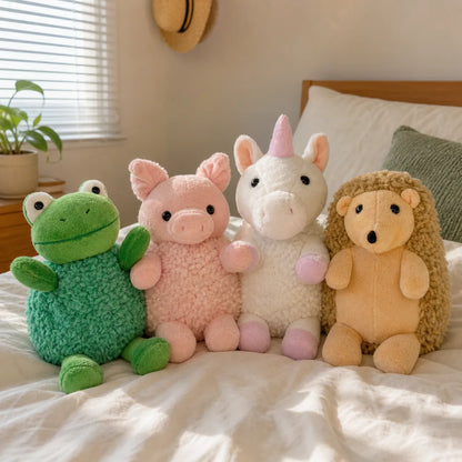 Fuzzy Plush Animal Collection on a Cozy Bed