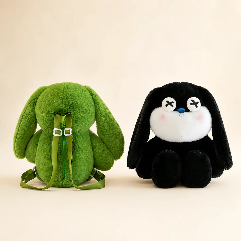 Green Sleepy Bunny Backpack Back View and Black Plush Toy