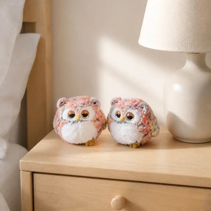 Pink Sleepy Owl Plush Pair on a Bedside Table