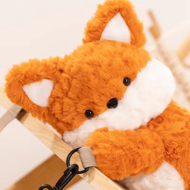 Adorable fox plush backpack with adjustable strap and small compartment