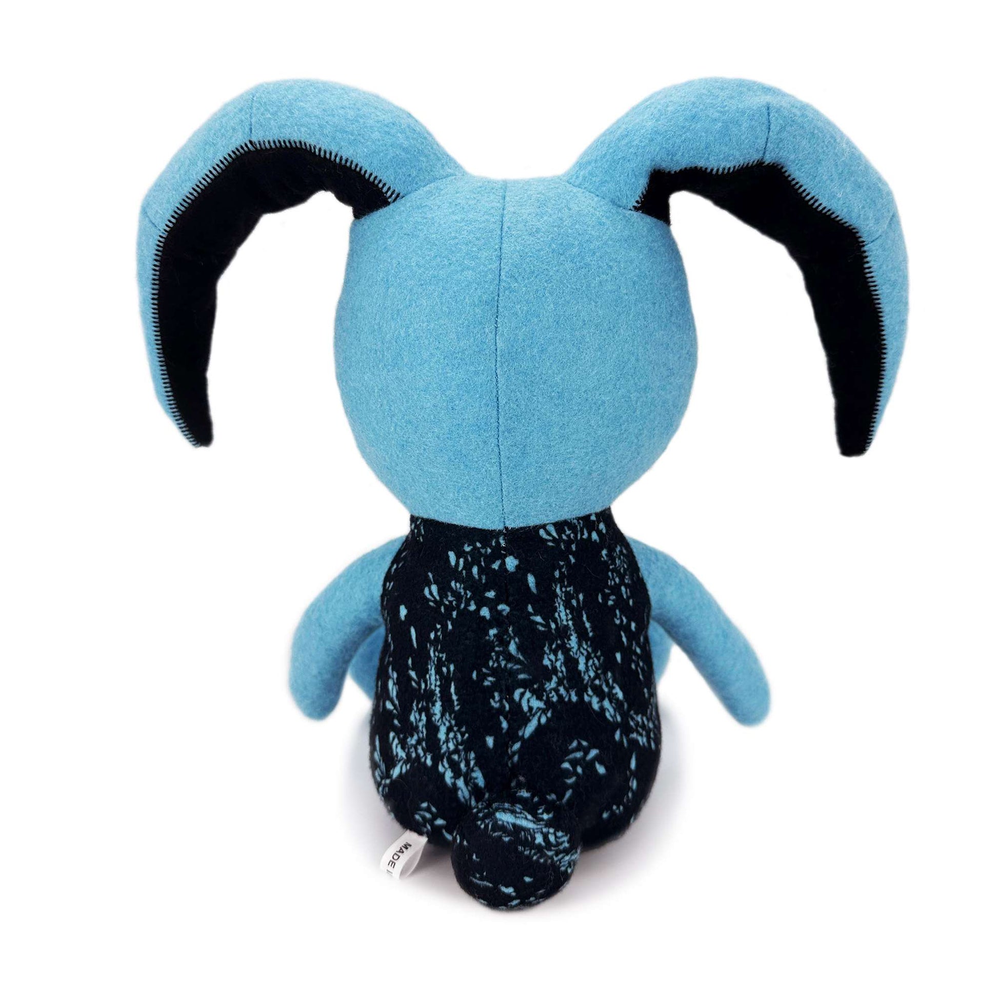 Blue rabbit plush toy back