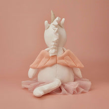 a unicorn plush toy