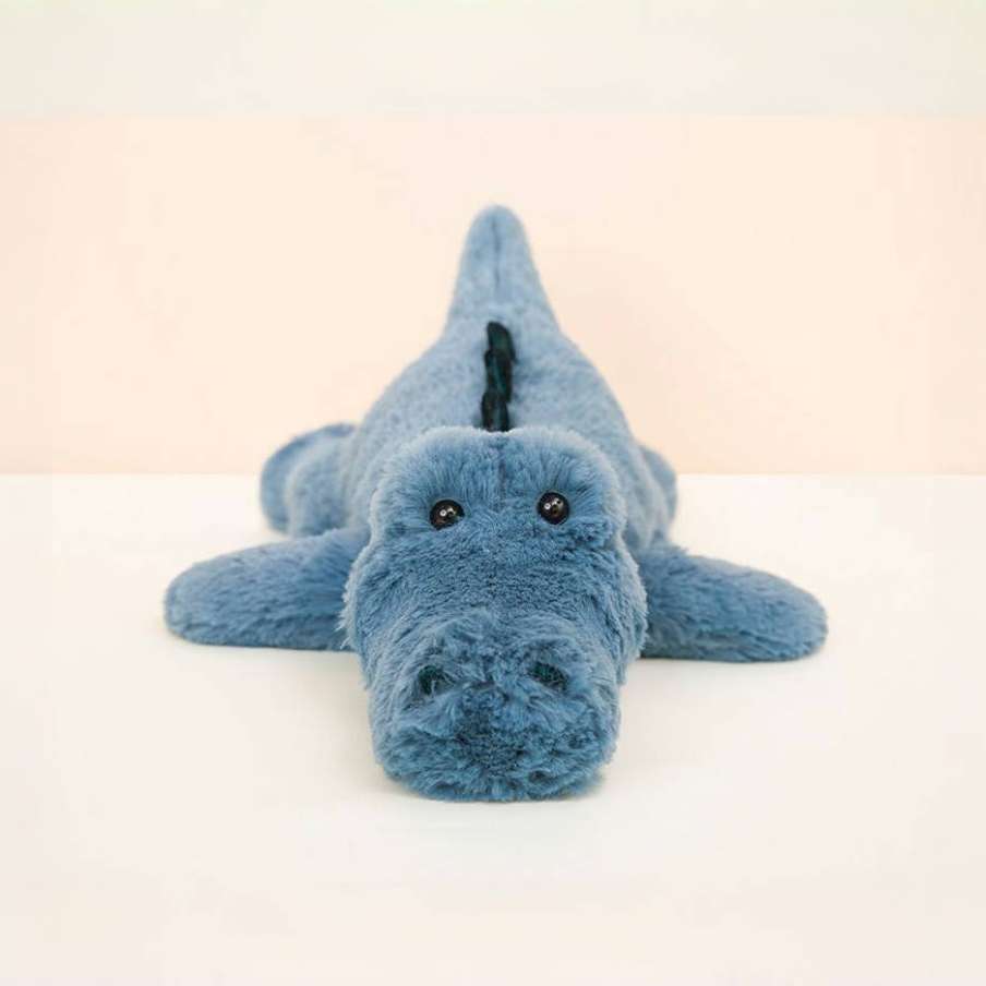 Cute blue stuffed alligator