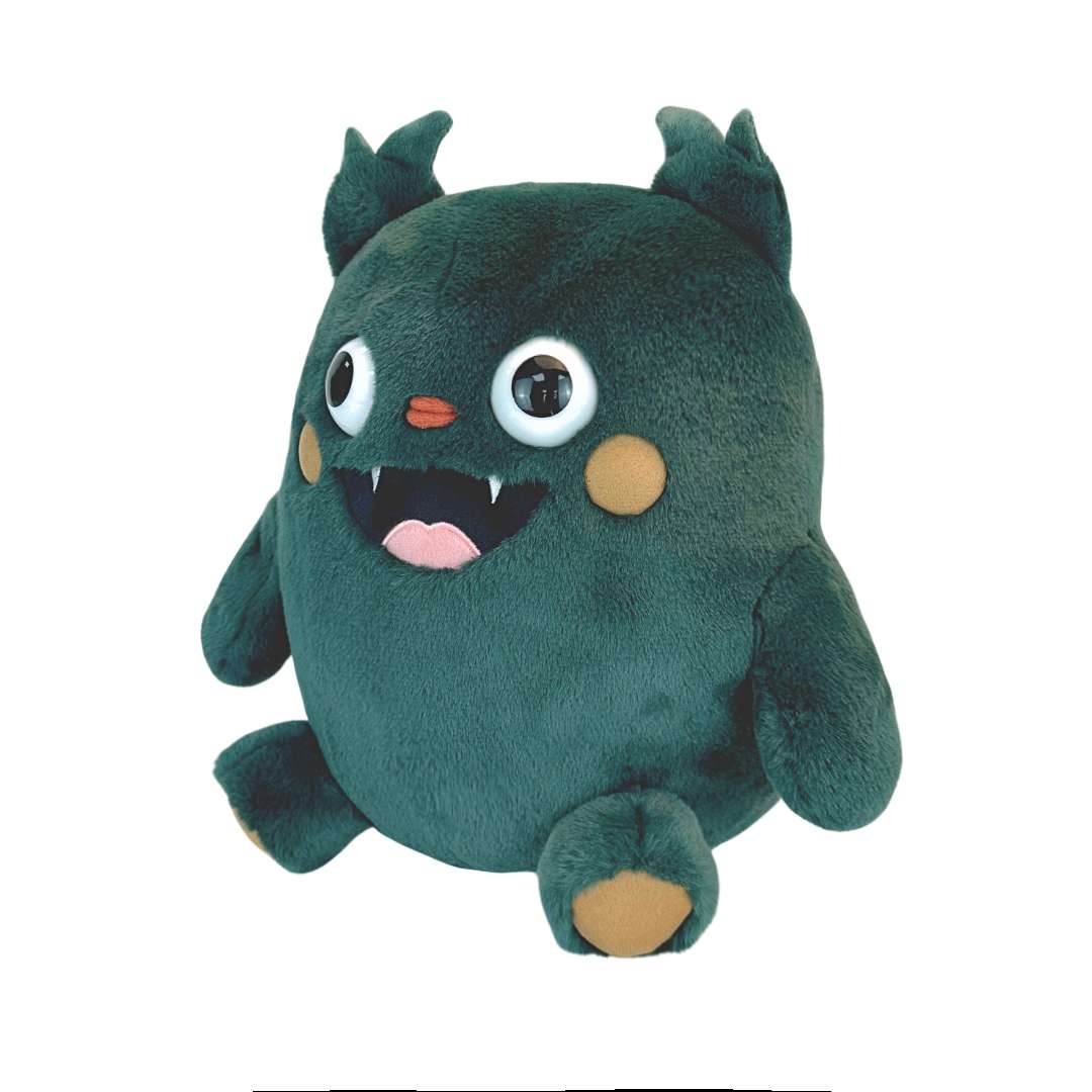 Cute green monster stuffed animal