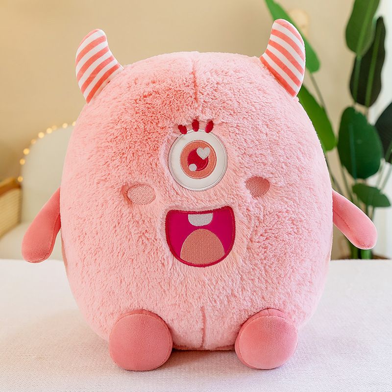 Cute little one-eyed monster plush toy
