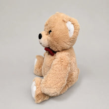 Beige Teddy Bear Stuffed Animal with Red Bow - Left Side View