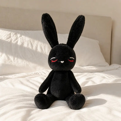 Emo Bunny with Angry Expression Plush on a Sunlit Bed