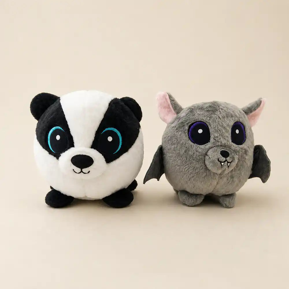 Black and White Badger and Gray Bat Plush Duo