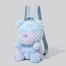 Blue tie-dye teddy bear backpack with a minimalist design