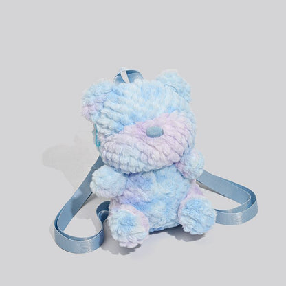 Blue tie-dye teddy bear backpack with a minimalist design