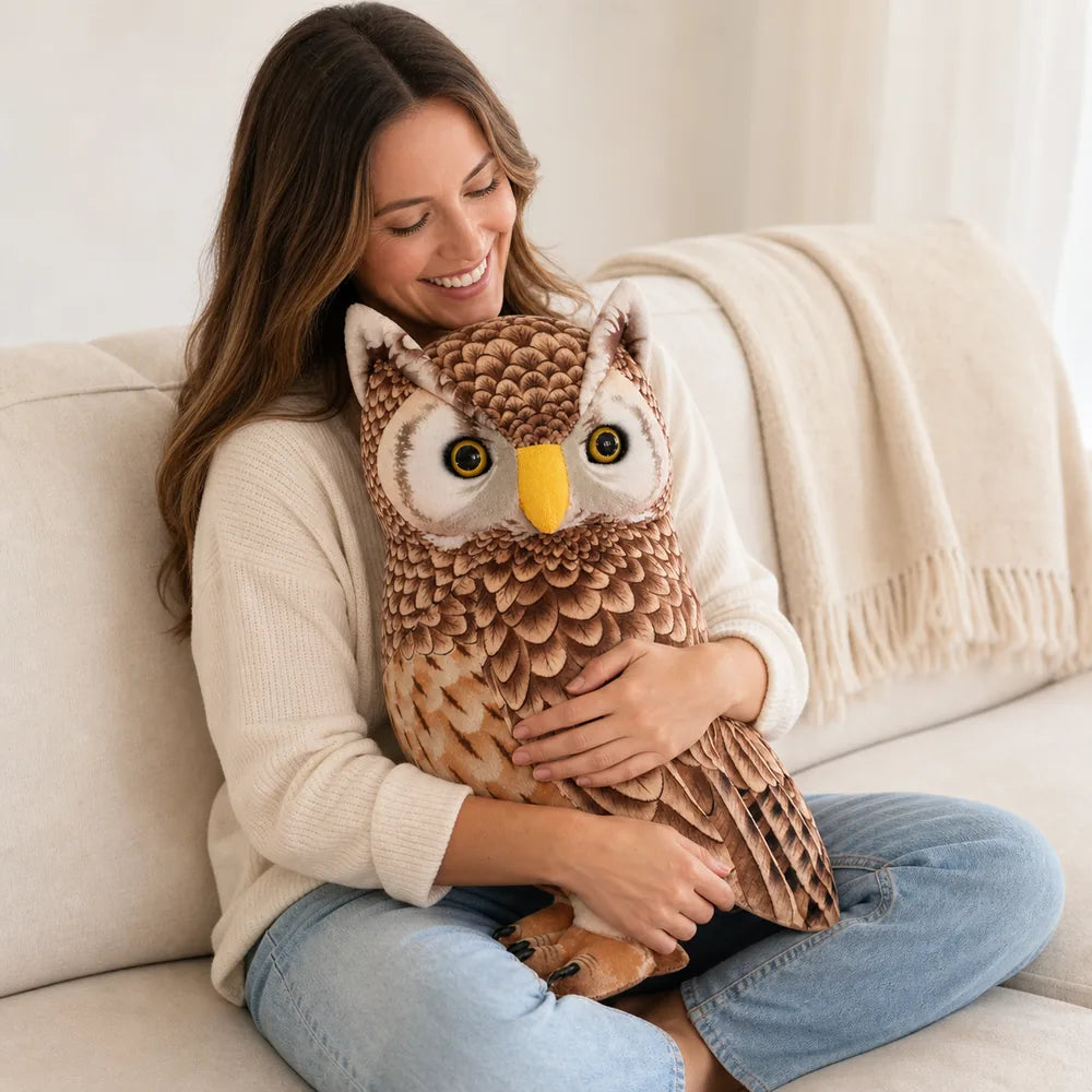 Woman Hugging Brown Owl Plush Stuffed Animal on Sofa