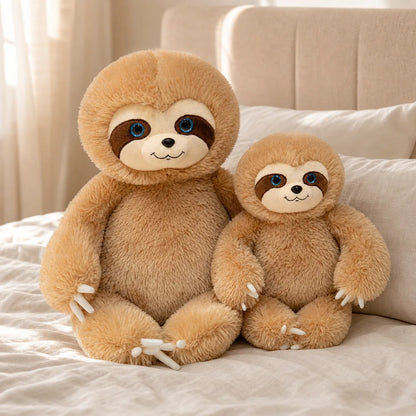 Cute Brown Sloth Stuffed Animals on a Cream Bed