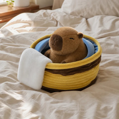 Capybara Sleeping Basket Plush on a Cozy Bed