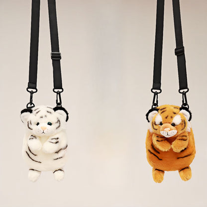 Adorable baby tiger plush backpack in white and orange with adjustable straps.