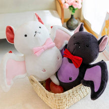 Stuffed black and white bat