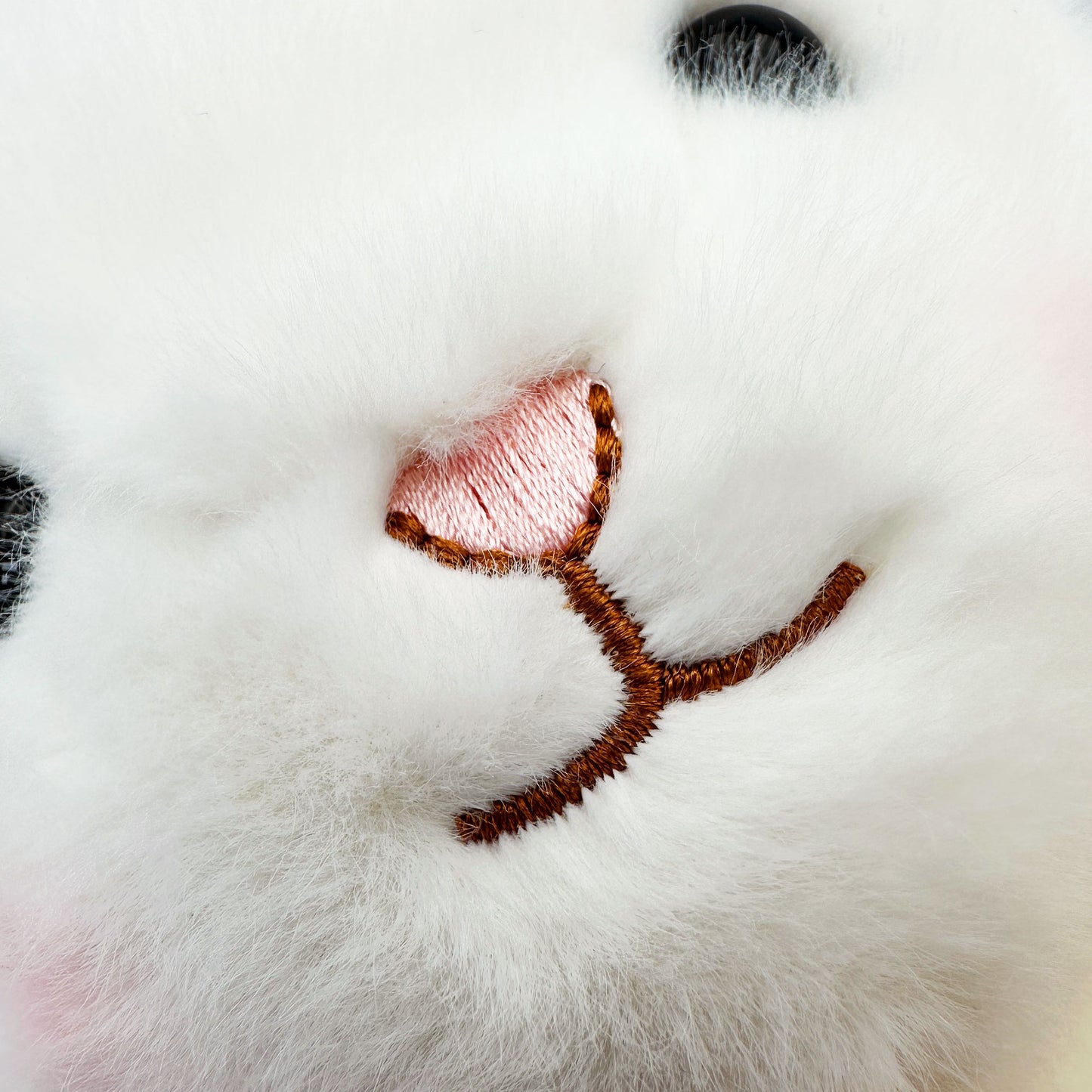 the face of a cute bunny stuffed animal