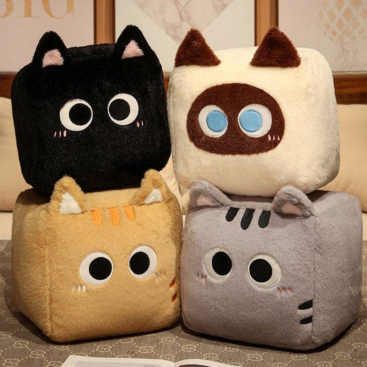 Four square cat plush pillows in different colors