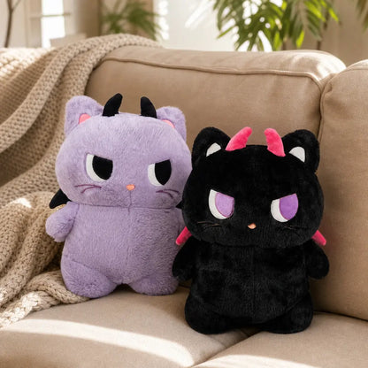 Purple and Black Devil Cat Plush Toys on Sofa