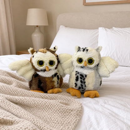 White and Brown Flying Owl Stuffed Animals on a Bed