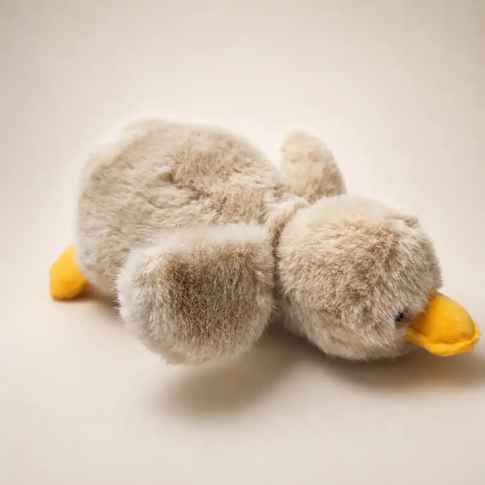 Yellow Fuzzy Duck Plush - Laying View