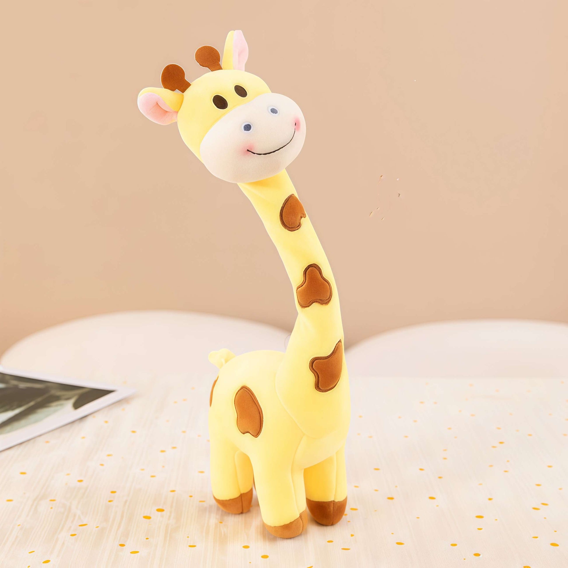 A yellow giraffe stuffed animal