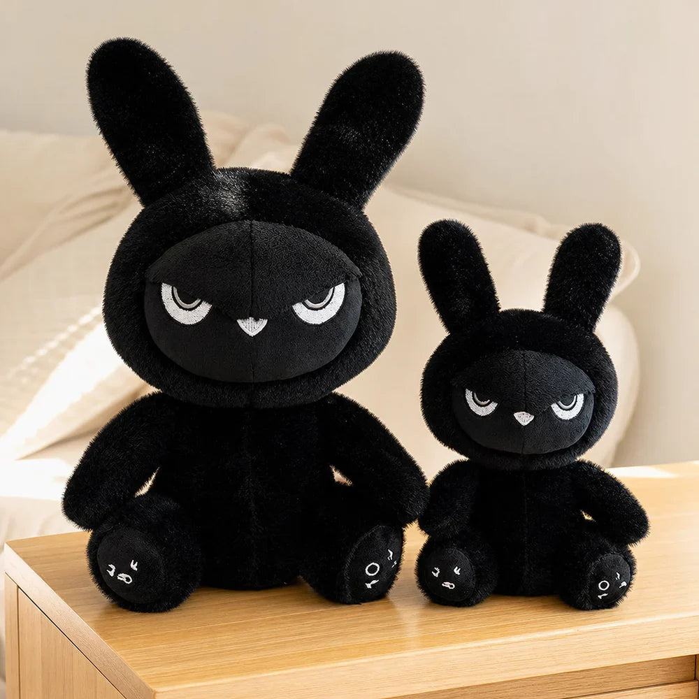 Black Gothic Bunny Plush on a Bedside Table