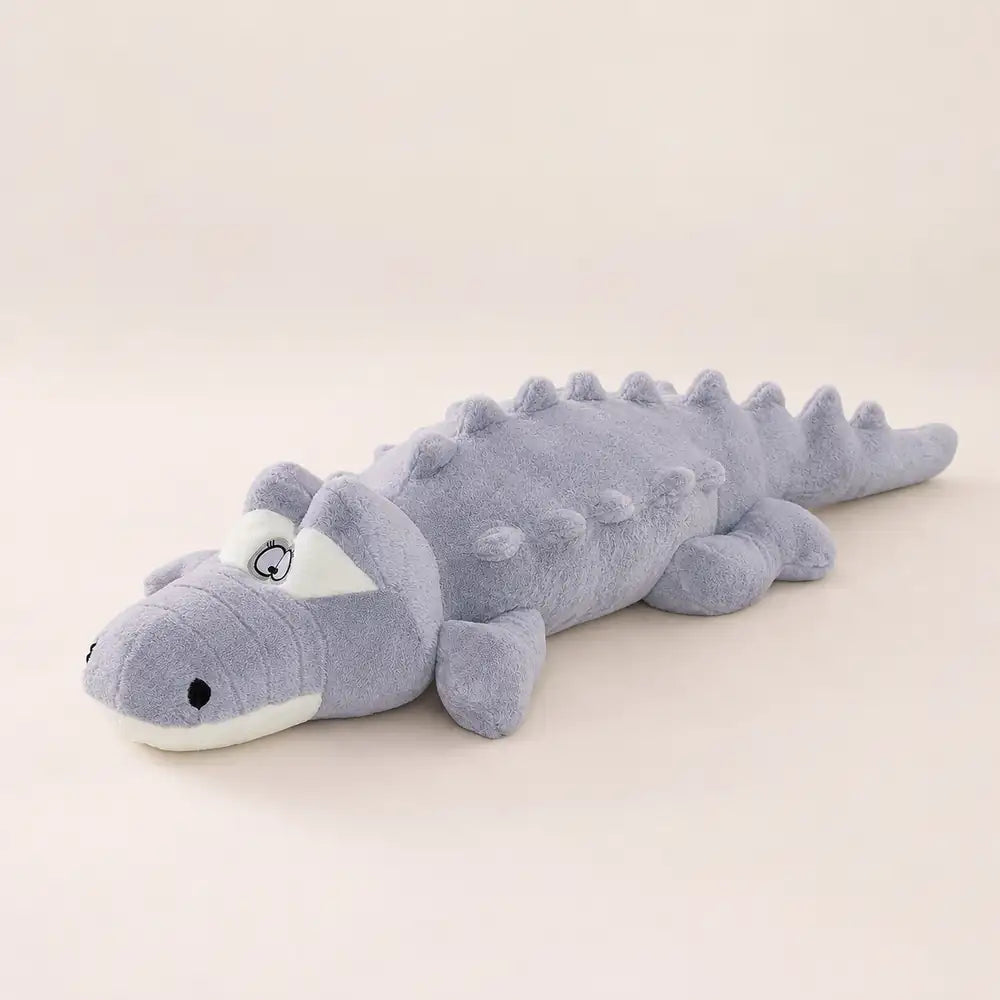 Gray 100cm crocodile plush front view on an ivory studio background