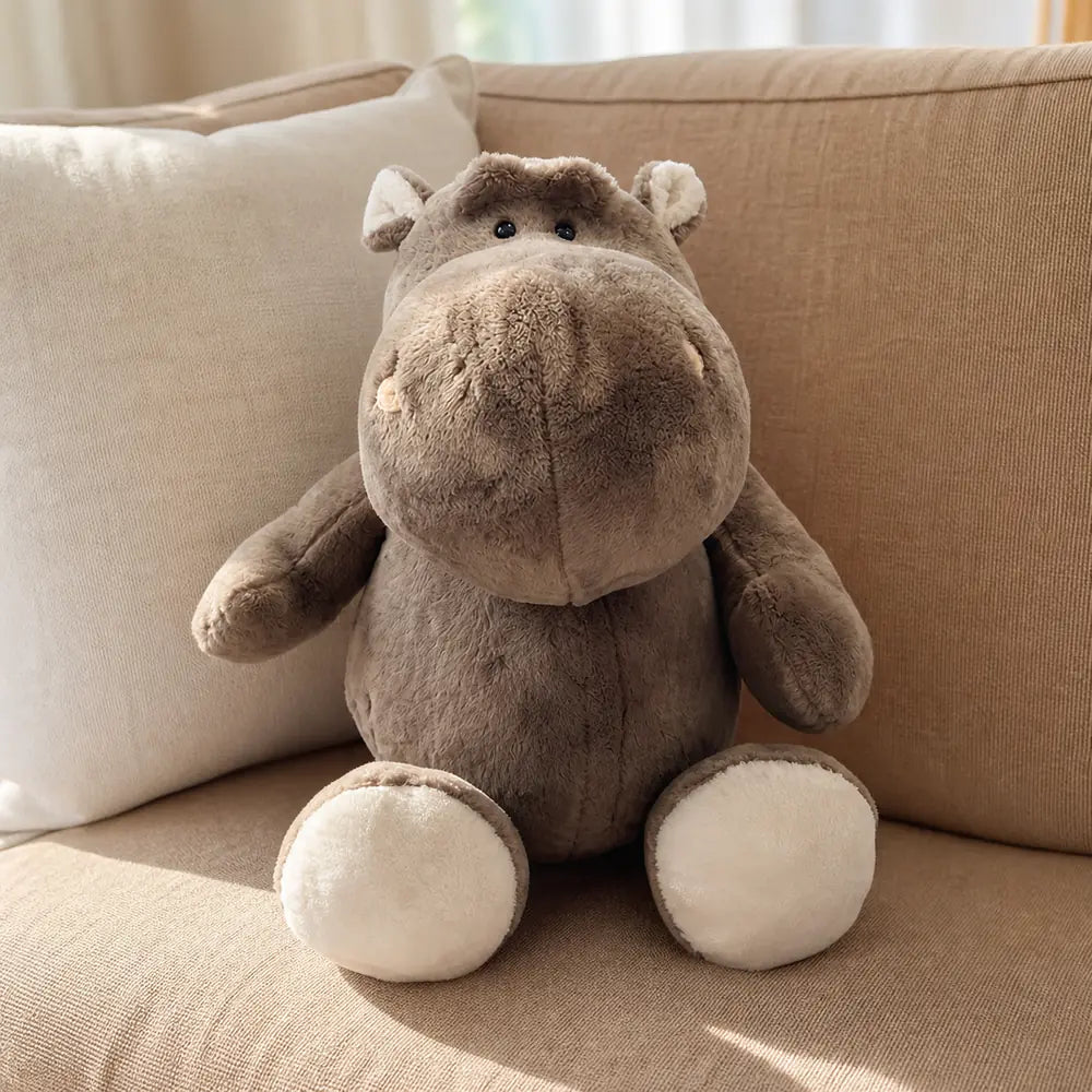 Gray Hippopotamus Plush Stuffed Animal on a Camel Sofa