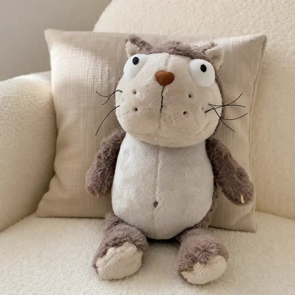 Gray Otter Plush Stuffed Animal on a Cozy Sofa
