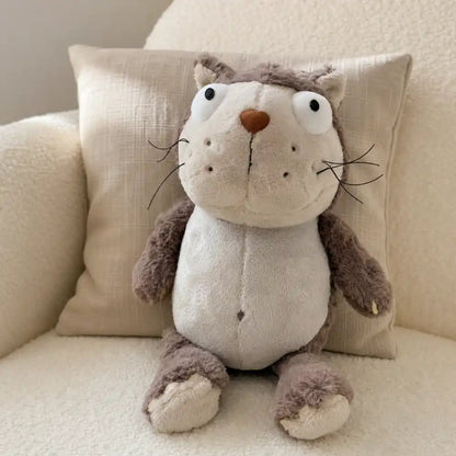Gray Otter Plush Stuffed Animal on a Cozy Sofa