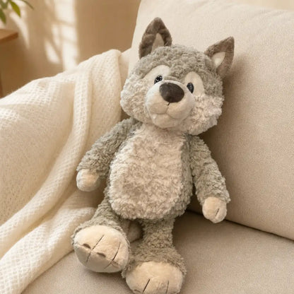 Gray Wolf Plush Stuffed Animal on Cozy Sofa