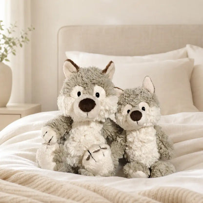 Gray Wolf Plush Stuffed Animals Two Sizes on Bed