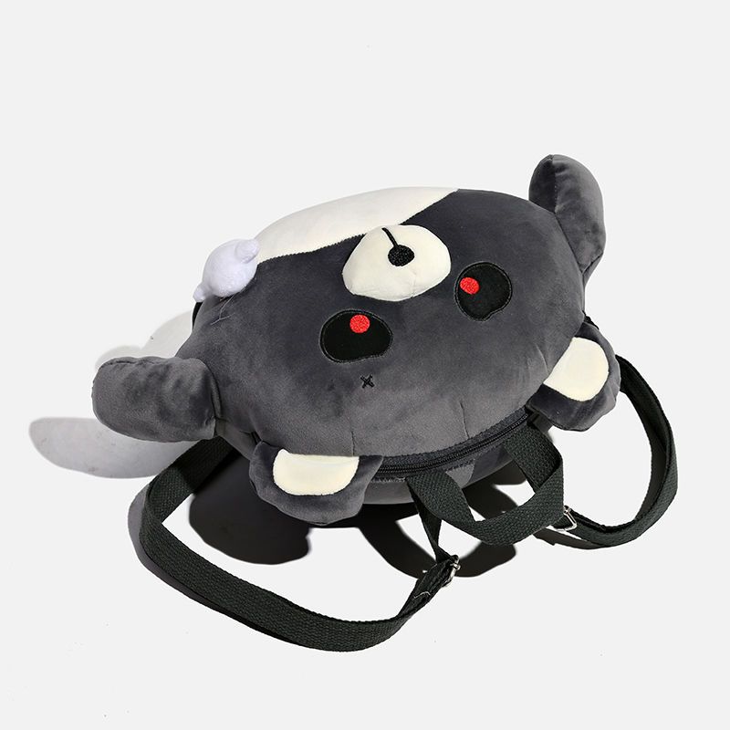 Gray teddy bear backpack with red eyes