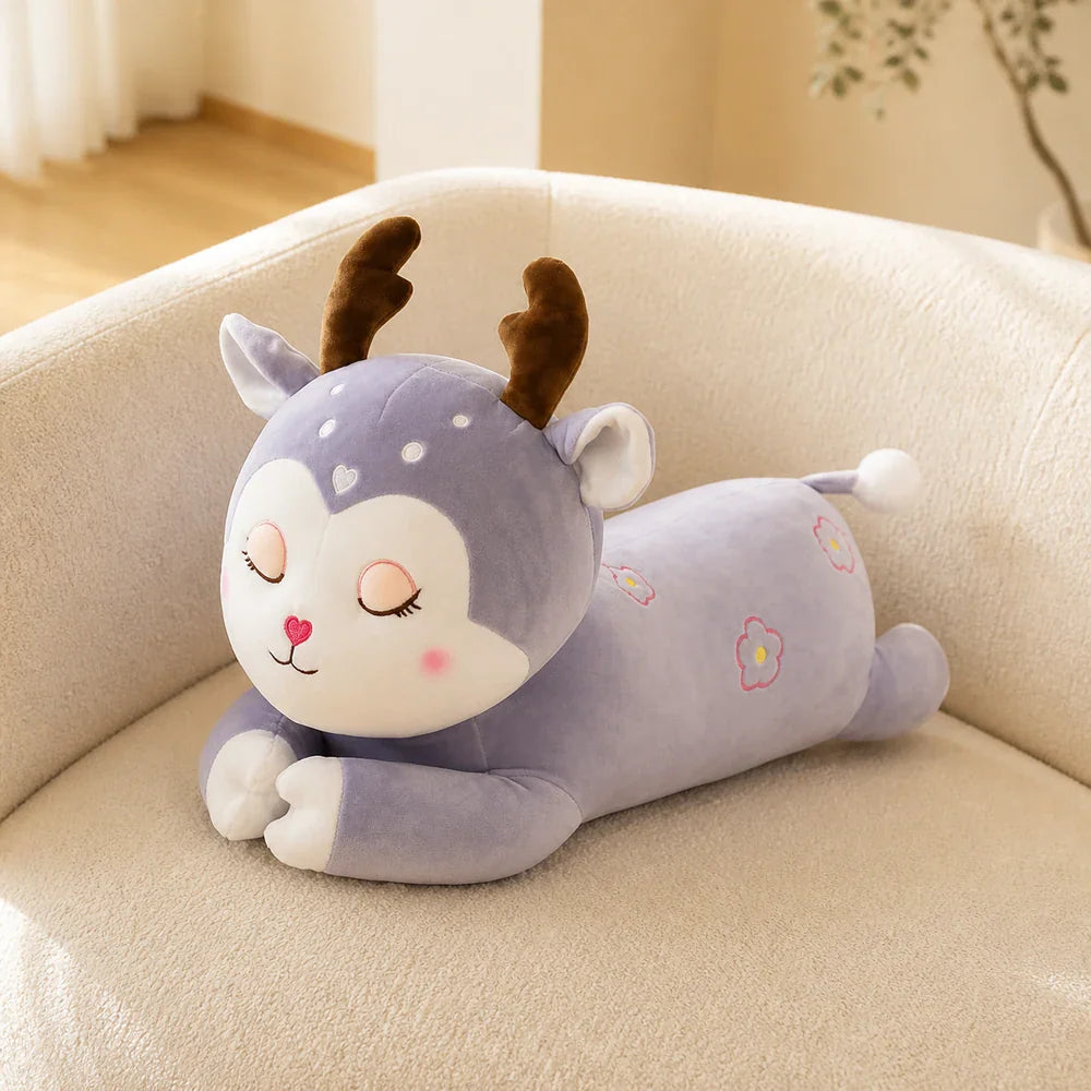 Lavender Floral Deer Plush Body Pillow on a Sofa