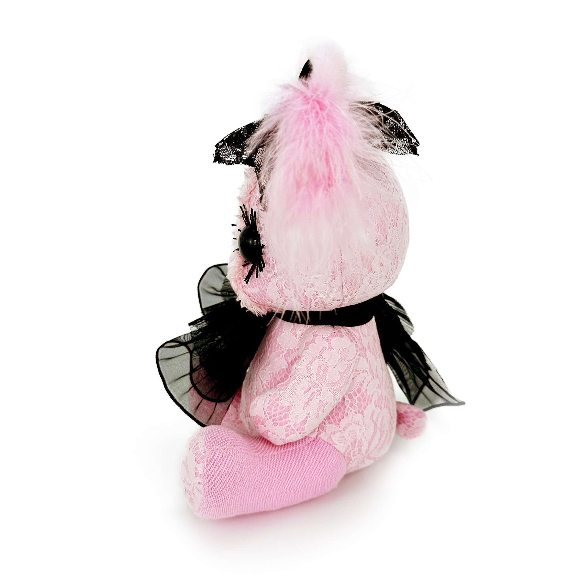 left overall figure pink bunny stuffed animal