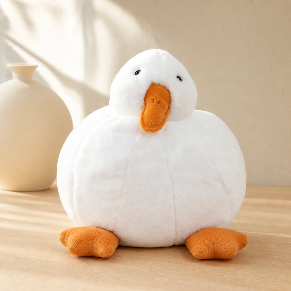 White Duck Plush on a Light Oak Table