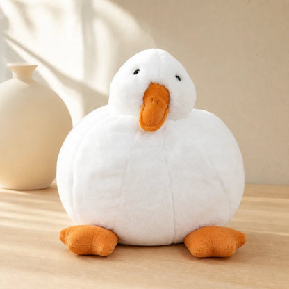 White Duck Plush on a Light Oak Table