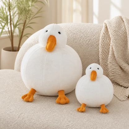 White Duck Plush Size Comparison on a Sofa