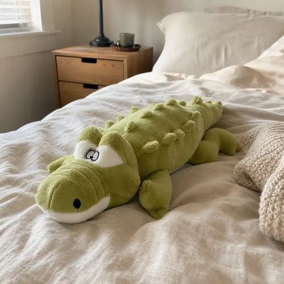 Light green 100cm crocodile plush on a cozy sunlit bed