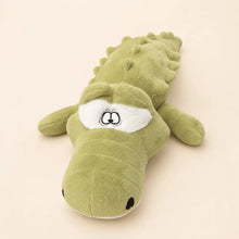 Light green 100cm crocodile plush front view on an ivory studio background