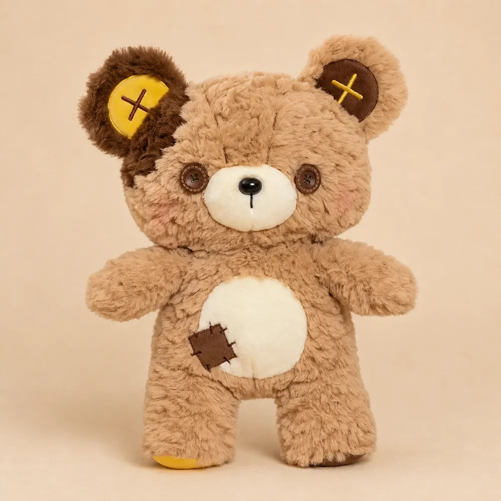Light Tan Patchwork Teddy Bear Plush on Oatmeal Studio Background
