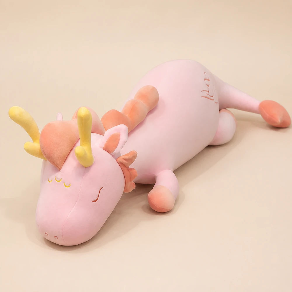 Pink Lovely Herbivore Dragon Plush on a Beige Studio Background