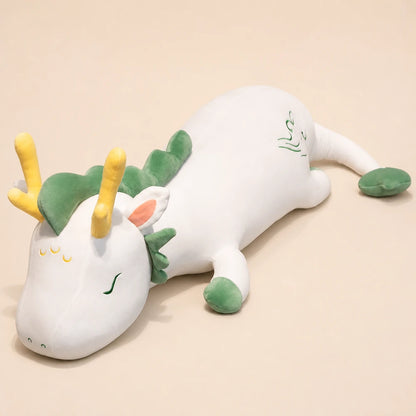 White and Green Lovely Herbivore Dragon Plush on a Beige Studio Background