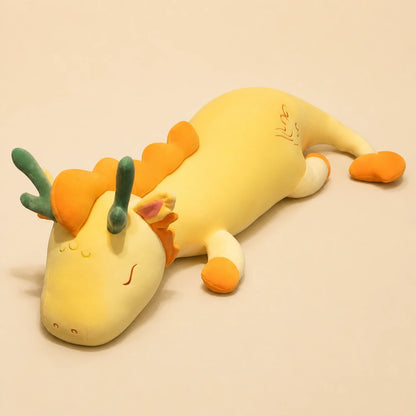 Yellow and Orange Lovely Herbivore Dragon Plush on a Beige Studio Background