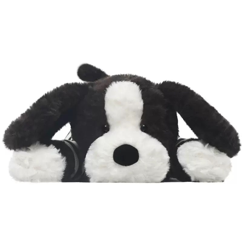 Lying Black and White Puppy Stuffed Animal