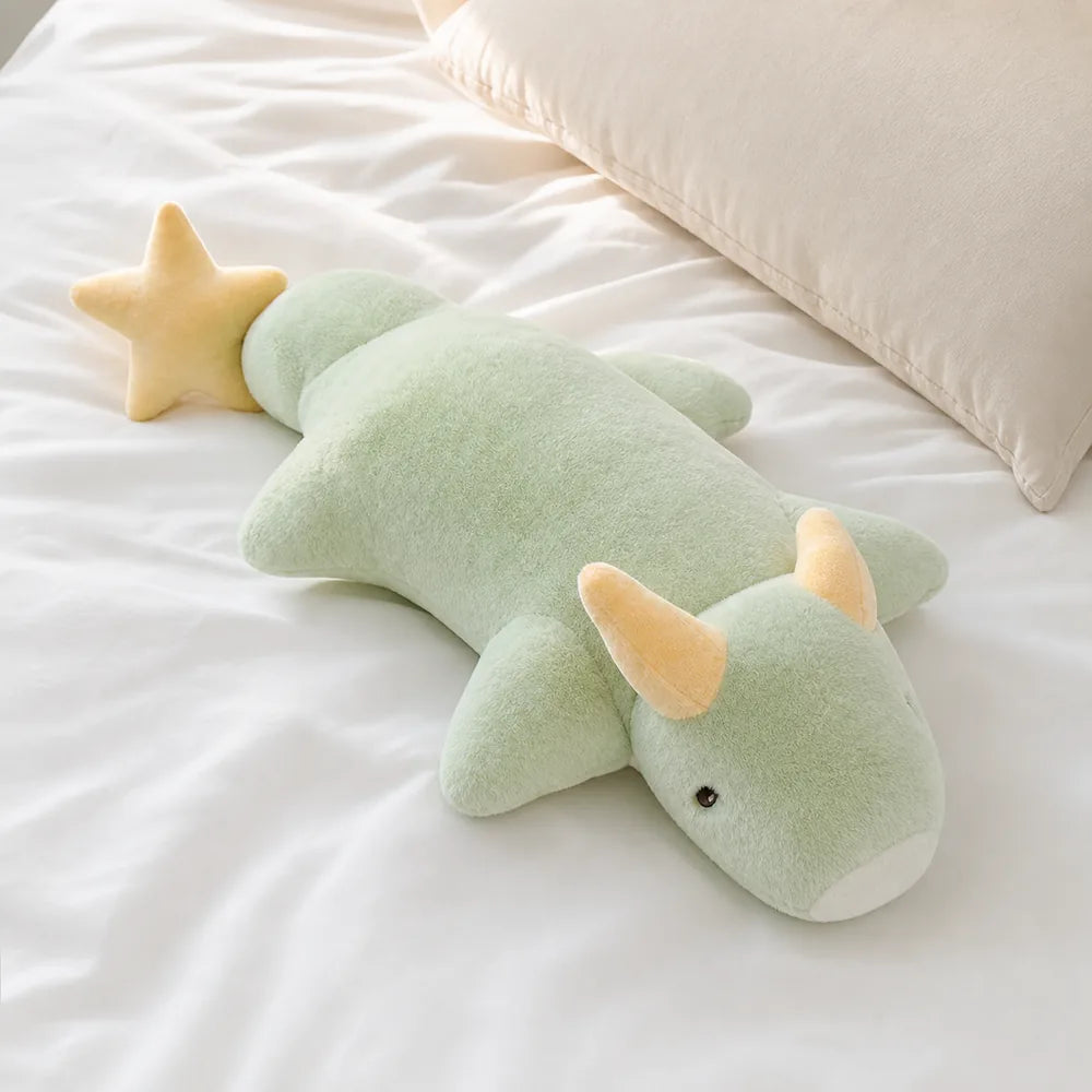 Mint Green Kawaii Dragon Plush on a White Bed