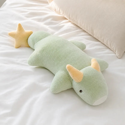 Mint Green Kawaii Dragon Plush on a White Bed